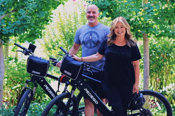Valerie Bertinelli with her husband posing with their Pedego Electric Bikes||