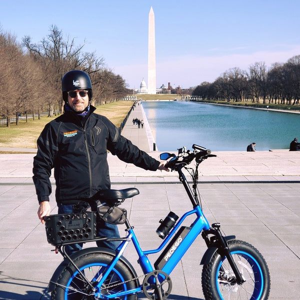 Pedego rider in front of the Washington Monument|Pedego Bethesda custom logo|Mineral Blue Pedego Interceptor|Cherry blossoms in Washington D.C.|Lincoln Memorial in Washington D.C.|