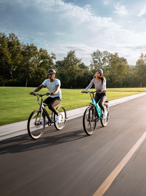 Young man and woman riding the new Pedego Avenue|The All New Pedego Avenue|Freedom to explore with your Pedego Avenue