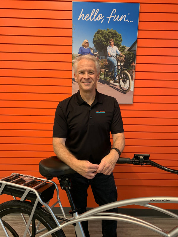 Mike Murphy from Pedego Eugene posing with bike.|