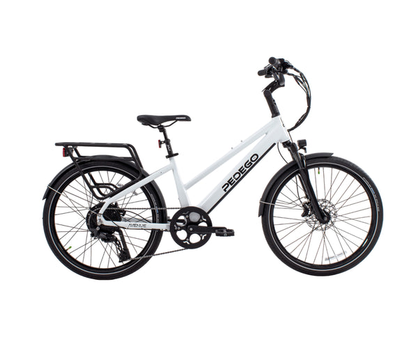 A white Pedego electric bicycle with black components, shown from a side profile view against a solid white background.