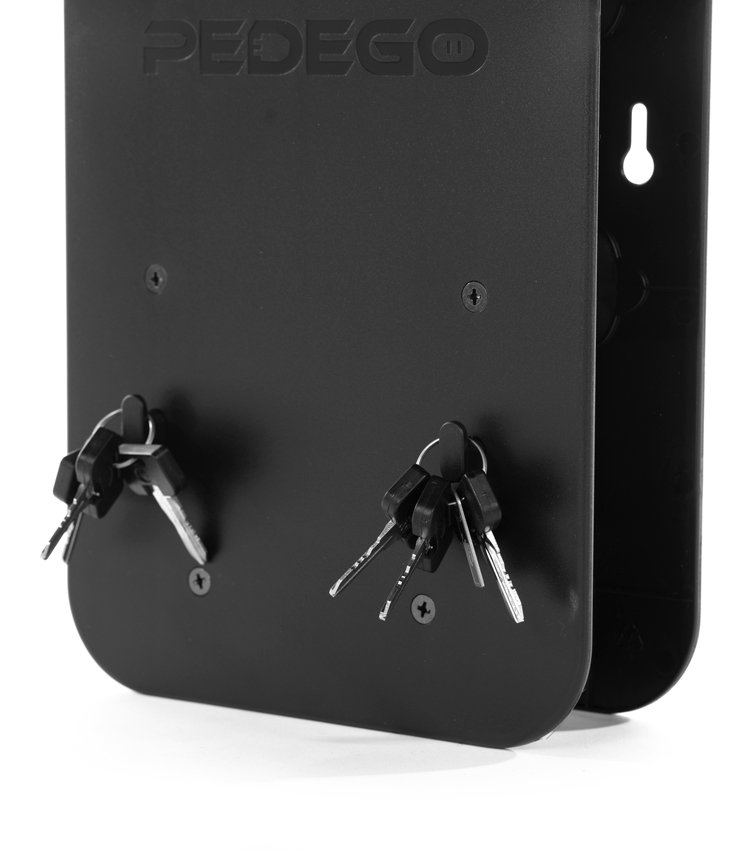 Keys hanging on Pedego Charger Caddy