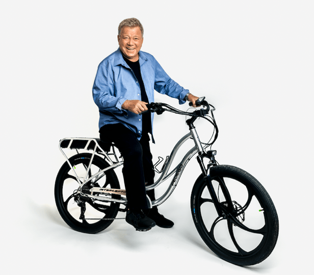 William Shatner on a Pedego Interceptor electric bike