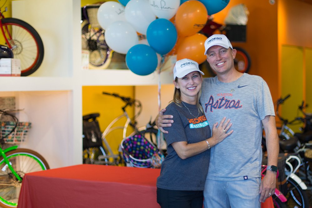 Owners of Pedego West Houston, Jason and Amanda in their store.