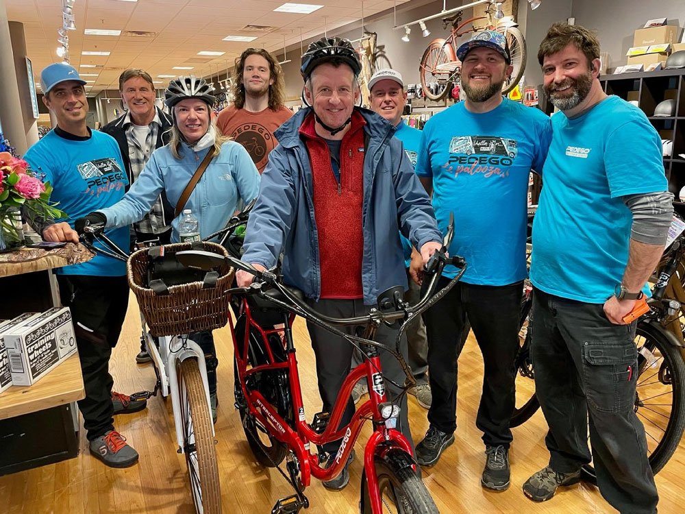 Owner, Marc, of Pedego Portsmouth and friends at his Palooza event.