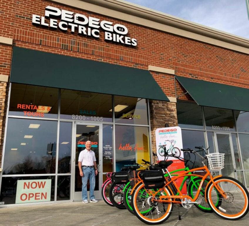 Owner of Pedego Triangle, Don Tuttle, outside of his storefront.