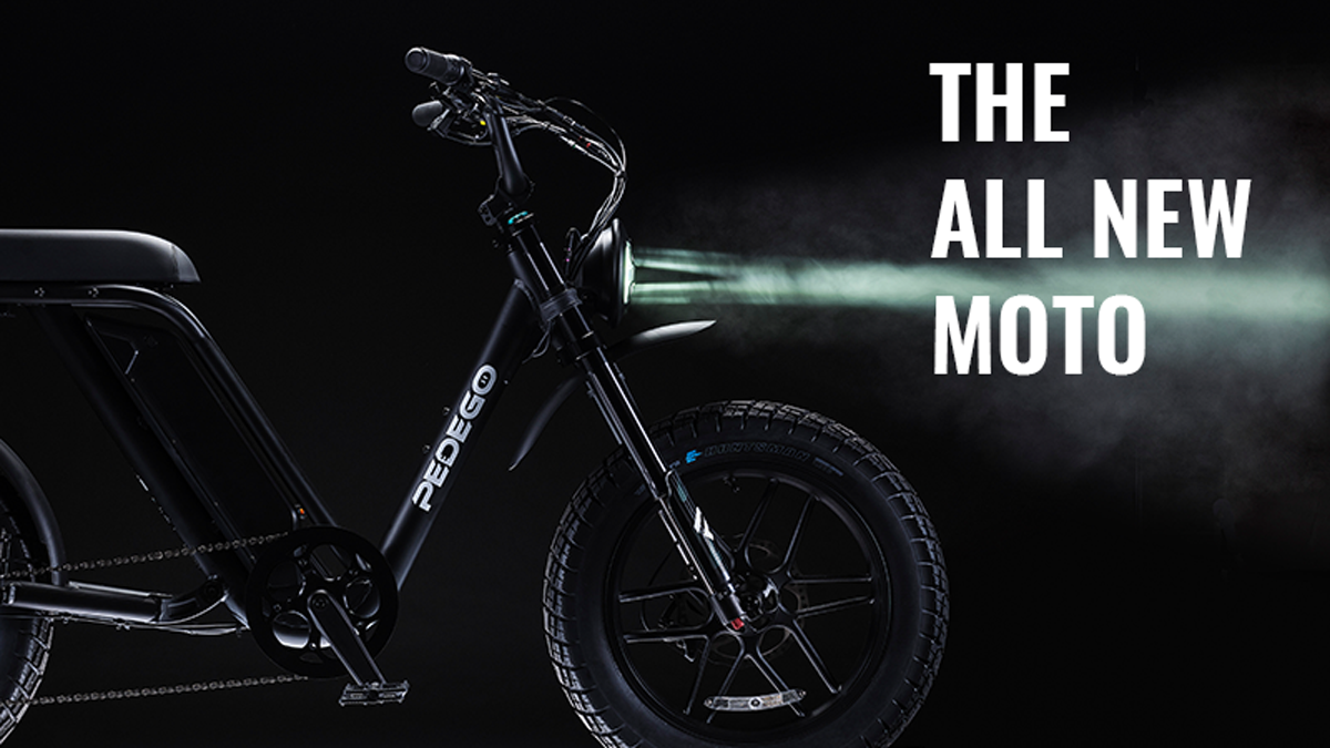 Pedego- Electric bike highlighted in a promotional image with dramatic lighting and text announcing it as "the all new moto.